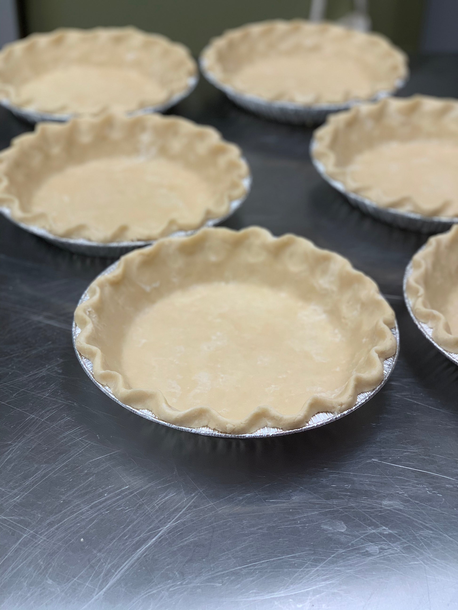 Vegan pie crust shells on table