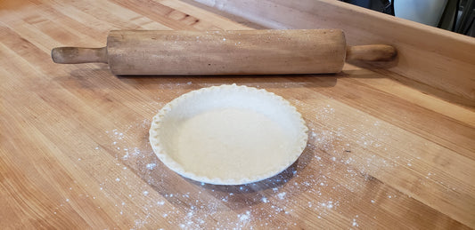 Homemade pie crust with rolling pin