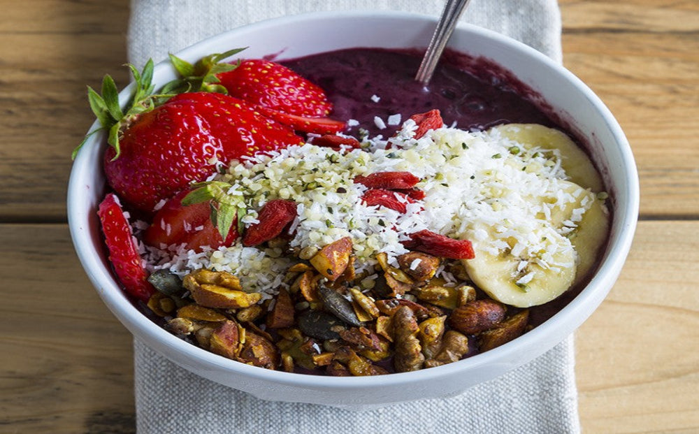 Acai smoothie bowl with scratch-made granola and fresh fruit at Sweet Peas in Dodge County